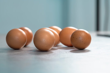 Close-up of a group of brown eggs