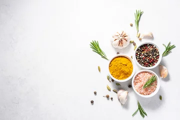 Foto auf Alu-Dibond Set of fresh organic aromatic spices and herb on white marble table with copy space for your text.  © Iryna