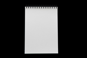 Blank notebook isolated on black background. Minimal style composition.