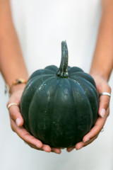 gourd in hands