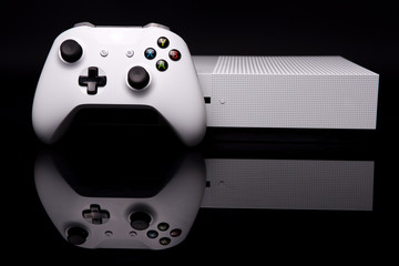 Gaming console against black background
