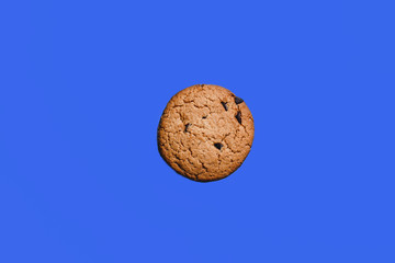 Fototapeta na wymiar chocolate cookies on a blue background