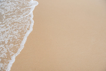 wave on the beach sand