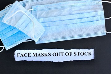 Announcement with Text face masks out of stock on black background with respiratory protective medical masks