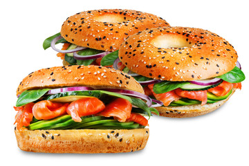 Smoked salmon spinach avocado cucumber bagel on a white isolated background