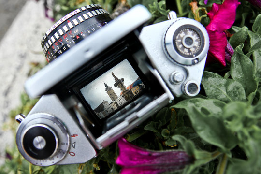 A view through the old reflex camera on the old historic town. 