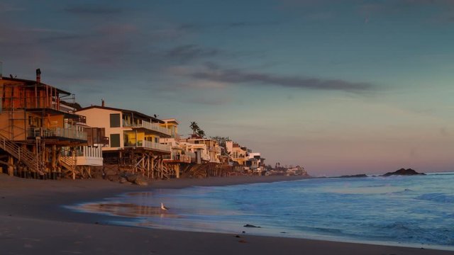 Oceanfront homes on Malibu Beach at sunset