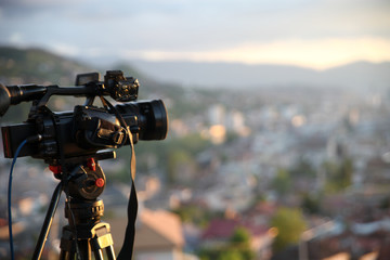 Professional video technician on assignment.Concept.-Waiting for the right moment.-Image