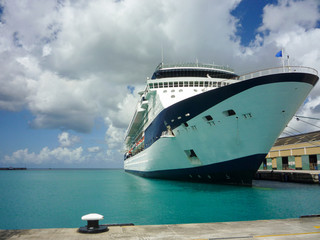 Celebrity Cruises luxury cruiseship or cruise ship liner docked at pier in Port of Bridgetown,...