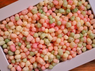 multi coloured puffed rice in a frame 