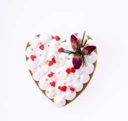  a sweet cake with white cream in the form of a heart for Valentine's Day for the restaurant menu