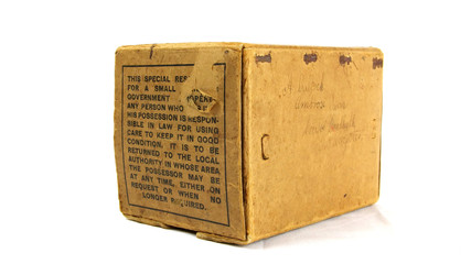 British WW2 Child’s 'Mickey Mouse’ Gas Mask and it's box. These were issued to all UK toddlers, the bright colours were designed to help turn using the mask into a game to keep the child calm 