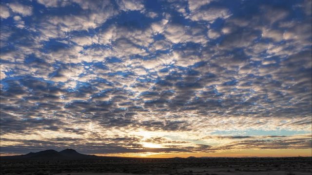 Cirrostratus clouds time lapse over the mojave desert