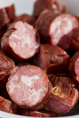 Slices of smoked kielbasa from a butcher in central Pennsylvania, USA