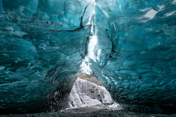 Amazing entrance to the ice cave inside glacier