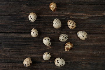 Quail eggs on wooden background