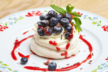 Meringue cake Pavlova with blueberry