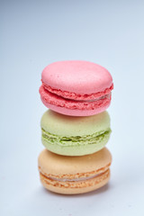 tasty macaroons on the grey background