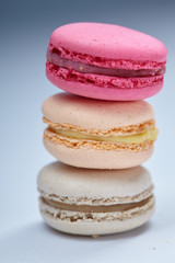 tasty macaroons on the grey background