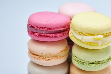 tasty macaroons on the grey background