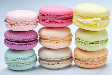 tasty macaroons on the grey background