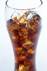 cola with ice cubes isolated