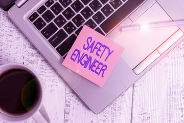 Writing note showing Safety Engineer. Business concept for demonstrating who inspects all possible...