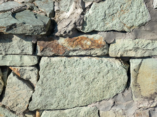  hand made irregularly built rock wall