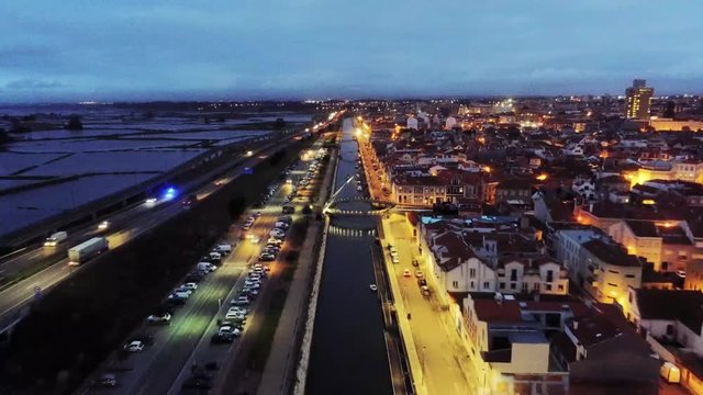 Late evening aerial drone view of the beautiful Aveiro, Portugal. Flying backwards drone view.
