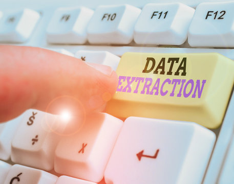 Writing note showing Data Extraction. Business concept for act or process of retrieving data out of data sources