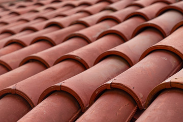 Close-up of an old house roof with a terracotta tiles (clay). Turkey