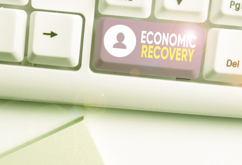 Handwriting text writing Economic Recovery. Conceptual photo rise of business activity signaling...