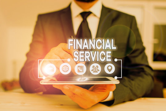 Conceptual hand writing showing Financial Service. Concept meaning economic services provided by the finance industry