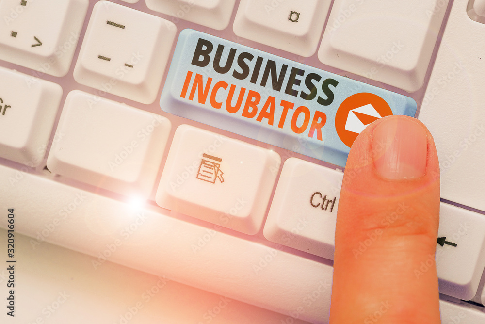 Poster writing note showing business incubator. business concept for company that helps new and startup com