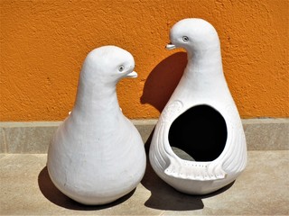 two ceramic birds