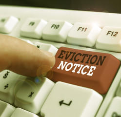 Writing note showing Eviction Notice. Business concept for an advance notice that someone must...