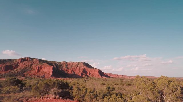 Time Lapse of clouds over a canyon during sunset