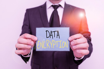 Conceptual hand writing showing Data Encryption. Concept meaning Conversion of data into code for...