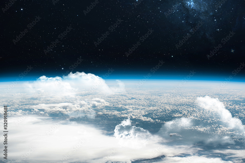 Poster Orbit of planet Earth with sky and clouds in outer space. Our home. Stratosphere. Way of ISS. Elements of this image furnished by NASA