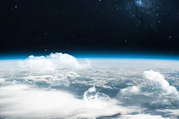 Zelfklevend Fotobehang Baan van de planeet aarde met lucht en wolken in de ruimte. Ons huis. Stratosfeer. Weg van ISS. Elementen van deze afbeelding geleverd door NASA © dimazel