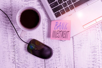 Writing note showing Bank Investment. Business concept for financial intermediary that performs a...