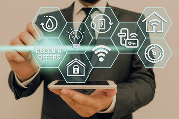 Writing note showing Discount Offers. Business concept for amount or percentage deducted from the normal selling price