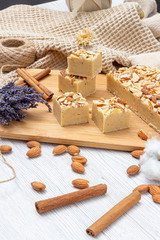 Fudge on a light table with nuts