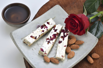 the nougat within fried fruit and almond