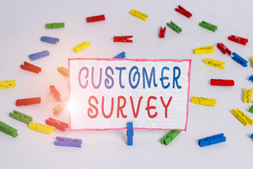 Conceptual hand writing showing Customer Survey. Concept meaning source to obtain information about consumer satisfaction Colored clothespin papers empty reminder white floor office