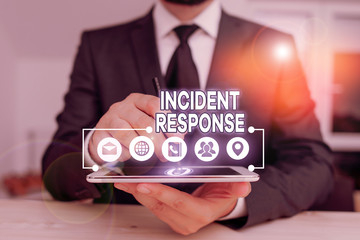 Conceptual hand writing showing Incident Response. Concept meaning addressing and analysing the aftermath of a security breach