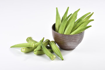okra on the bowl at the white background