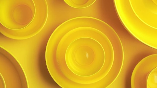 Abstract yellow plastic bowls layers background