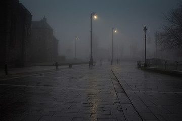 Fototapeta na wymiar Paisley Town centre and Paisley Catheral in the early winter mornng mist