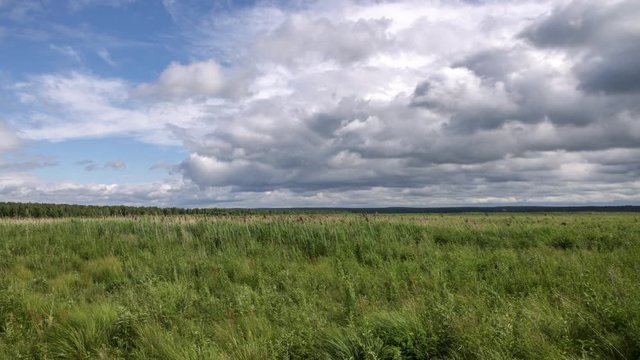 Field and clouds, time lapse, cam3